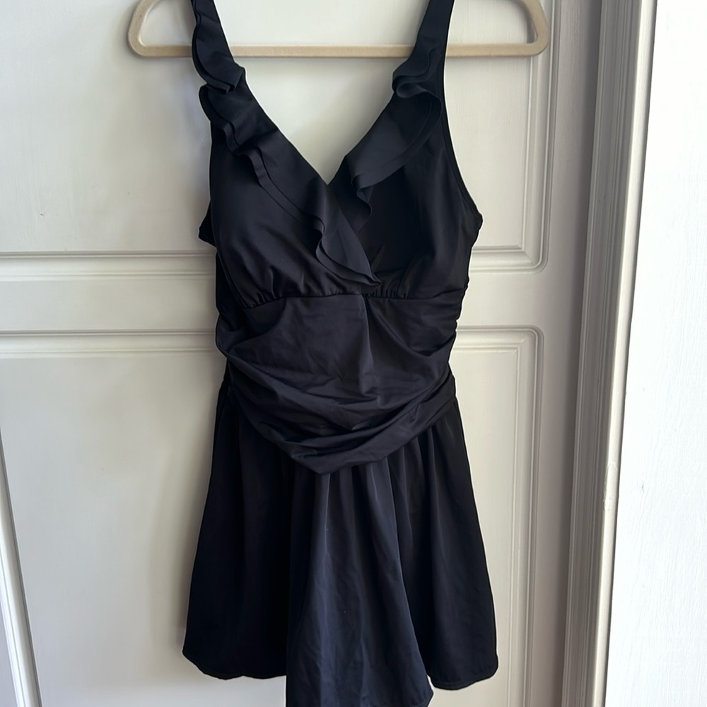 New without tag black swim dress. Size 14